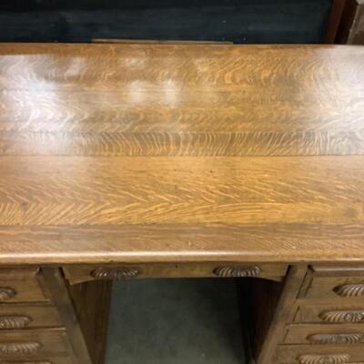 Lot. 5505. Vintage Nine Drawer Oak Desk