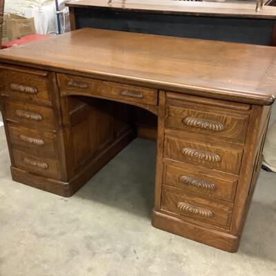 Lot. 5505. Vintage Nine Drawer Oak Desk