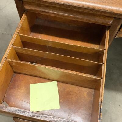 Lot. 5505. Vintage Nine Drawer Oak Desk