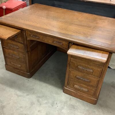Lot. 5505. Vintage Nine Drawer Oak Desk