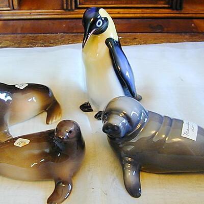Signed Porcelain Figurines - 2 Seals, 1 Penguin, 1 Manatee