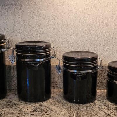 Lot 73: Black Ceramic Cannister