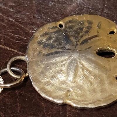 Lot 95: Vintage 14k Yellow Gold Necklace ITALY w/ Sand Dollar Charm