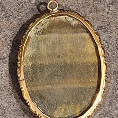 Lot 129: Large Tiger's Eye Gold Plated Pendant