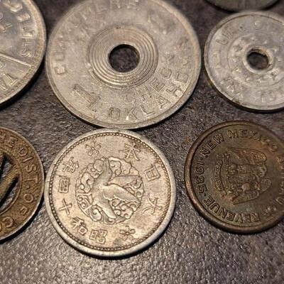 Lot 134: Assortment of Vintage TAX COINS