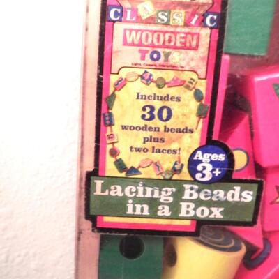 NEW WOODEN PUZZLE BLOCKS AND YOUNG CHILDRENS FUN