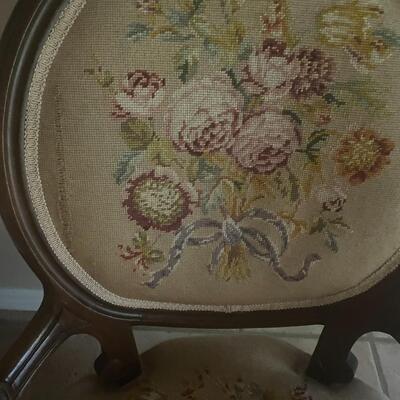 Low sitting antique chair