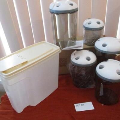 Tri-level cupcake holder. Canisters