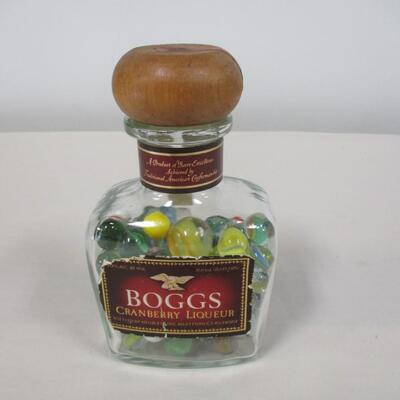 Collection Of Marbles In A Bottle