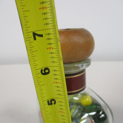 Collection Of Marbles In A Bottle