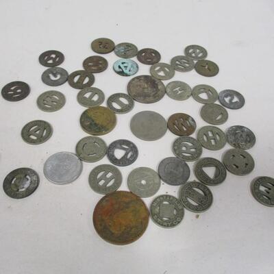 Collection Of Bus/Subway Tokens