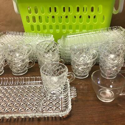 P10. Glass luncheon set and plastic basket