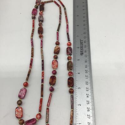 Plastic type beaded necklace
