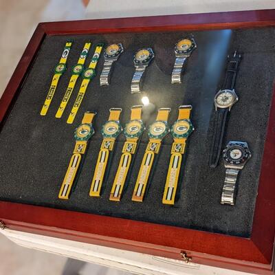 Display Case of a Variety of GB Dominator Watches, Steeler and Brewer Watch