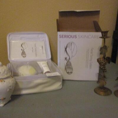 Serious Skin Care toning System. gold Candle Holders