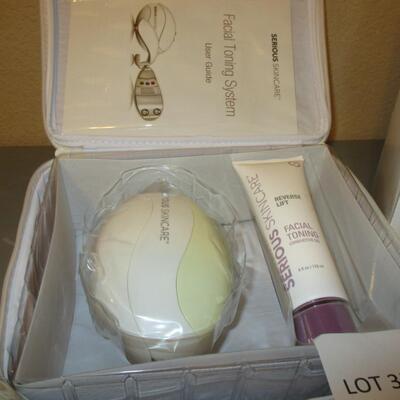 Serious Skin Care toning System. gold Candle Holders