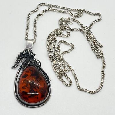 LOT 6: Sterling Silver and Amber Pendant on 30
