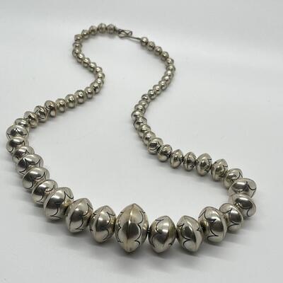 LOT 21: 22-inch Strand of Sterling Silver Graduated "Navajo Pearls" - 75 grams total weight