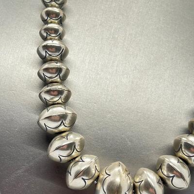 LOT 21: 22-inch Strand of Sterling Silver Graduated "Navajo Pearls" - 75 grams total weight