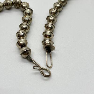 LOT 21: 22-inch Strand of Sterling Silver Graduated "Navajo Pearls" - 75 grams total weight