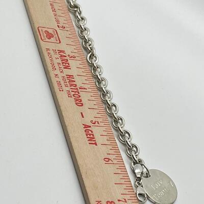 LOT 26: Sterling Silver Charm Bracelet - 30.1 Grams total weight