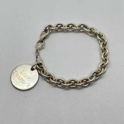 LOT 26: Sterling Silver Charm Bracelet - 30.1 Grams total weight