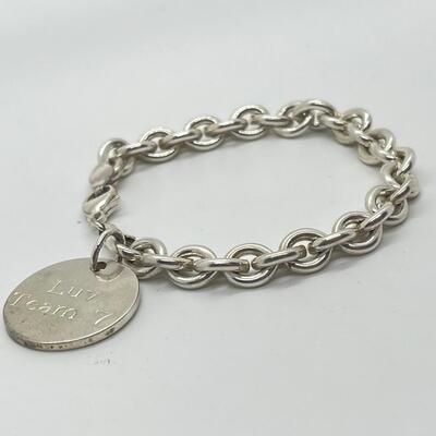 LOT 26: Sterling Silver Charm Bracelet - 30.1 Grams total weight