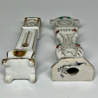 Pair of white with flower pattern grandfather clocks ceramic figurines