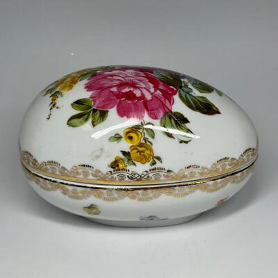 White and flower pattern egg shaped ceramic trinket box