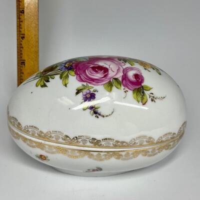 White and flower pattern egg shaped ceramic trinket box