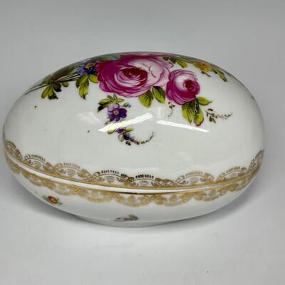 White and flower pattern egg shaped ceramic trinket box