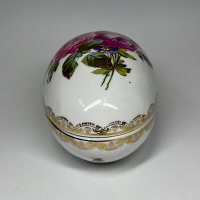 White and flower pattern egg shaped ceramic trinket box