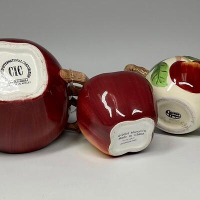 Lot of three apple themed tea pot and sugar bowls