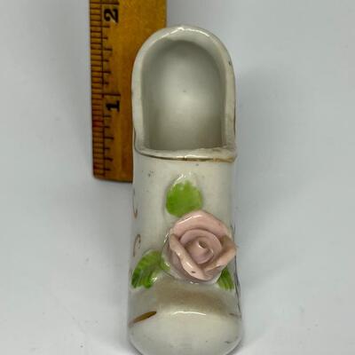 White and flower pattern ceramic shoe New York City