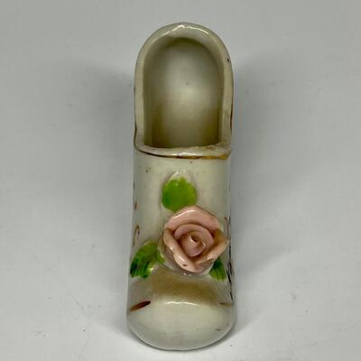 White and flower pattern ceramic shoe New York City