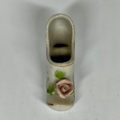 White and flower pattern ceramic shoe New York City