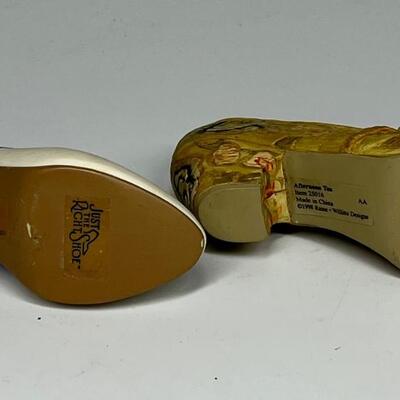 Pair of miniature white purple and gold shoe figurines