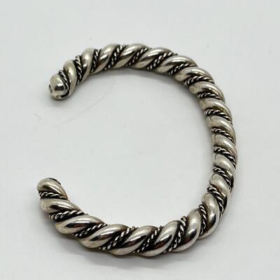 LOT 49: Navajo Sterling Silver Twisted Cuff Bracelet - 60 grams total weight