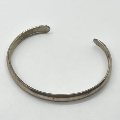 LOT 60: Two Sterling Silver Cuff Bracelets by Artisan ML - 25.7 grams total weight