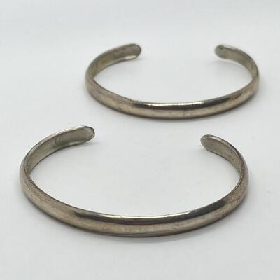 LOT 60: Two Sterling Silver Cuff Bracelets by Artisan ML - 25.7 grams total weight