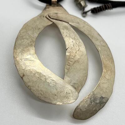 LOT 71: Handcrafted Hammered Silver Pendant on 20" Cord Necklace