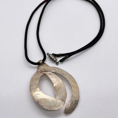 LOT 71: Handcrafted Hammered Silver Pendant on 20" Cord Necklace