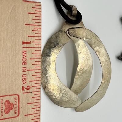 LOT 71: Handcrafted Hammered Silver Pendant on 20" Cord Necklace