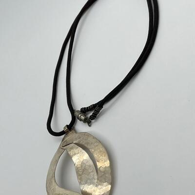 LOT 71: Handcrafted Hammered Silver Pendant on 20" Cord Necklace