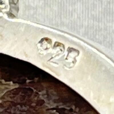 LOT 74: Sterling Silver & Possibly Raw Gemstone Pendant on 20" Sterling Rope Chain