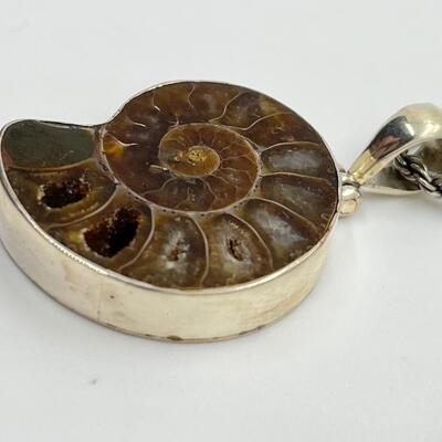 LOT 74: Sterling Silver & Possibly Raw Gemstone Pendant on 20