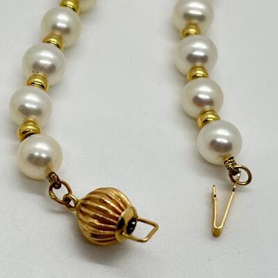 LOT 75: Strand of Cultured Pearls with 14K Gold Clasp in Italian Leather Case