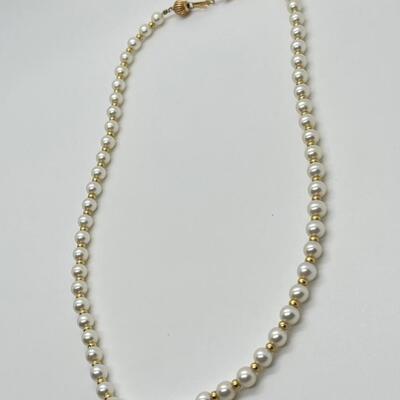 LOT 75: Strand of Cultured Pearls with 14K Gold Clasp in Italian Leather Case