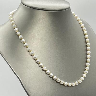 LOT 75: Strand of Cultured Pearls with 14K Gold Clasp in Italian Leather Case