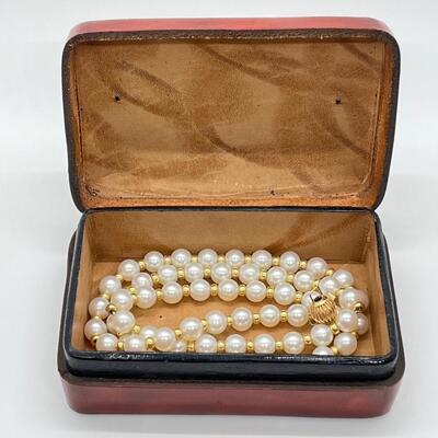 LOT 75: Strand of Cultured Pearls with 14K Gold Clasp in Italian Leather Case